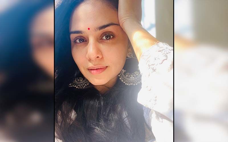 Amruta Khanvilkar Rocks A Stunning T-shirt Dress With Her Long Curly Tresses In A Bewitching Look
