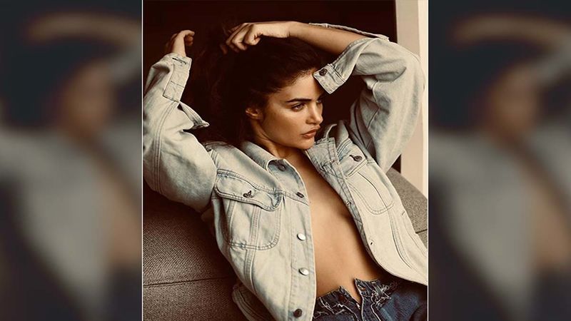 Arjun Rampal’s Girlfriend Gabriella Demetriades Poses Wearing A Buttonless Jacket Flaunting Her Hot Bod
