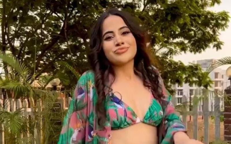 Urfi Javed Trolled For Wearing Sultry Floral Green Bikini, Fans Say ‘Tum Kisi Cartoon Se Kam Nahi’