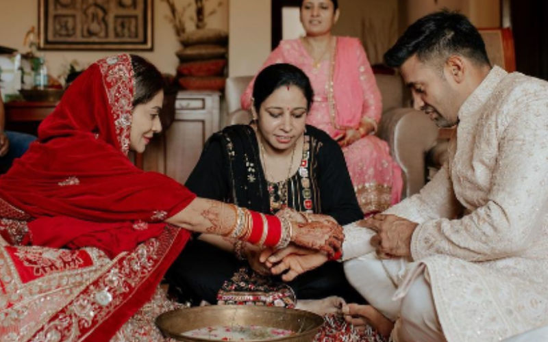 Newlyweds Payal Rohatgi, Sangram Singh Find Ring From The Bowl Of Milk And Petals In Post Wedding Rituals-See PICS