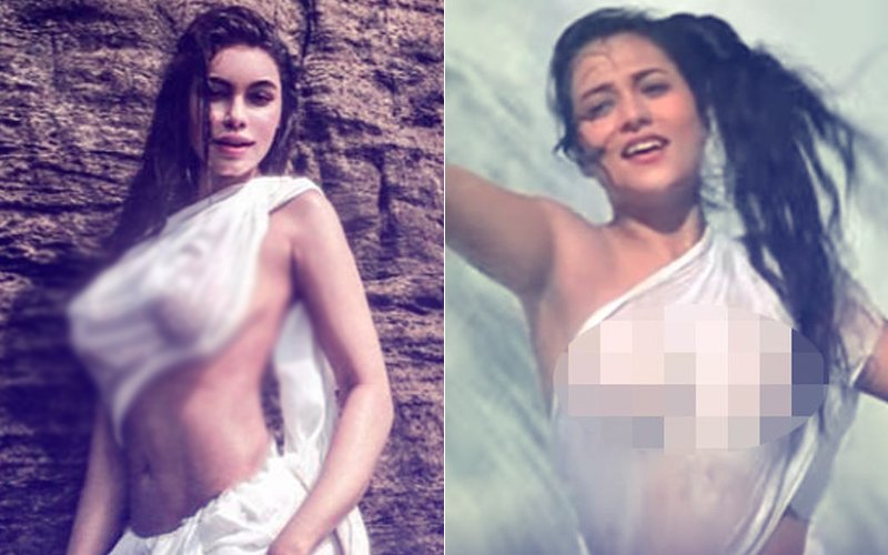 Sporting a wet white saree and standing by a waterfall, Gizele Thakral&apos...