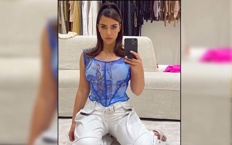 Kim Kardashian debuts SKIMS waist trainer