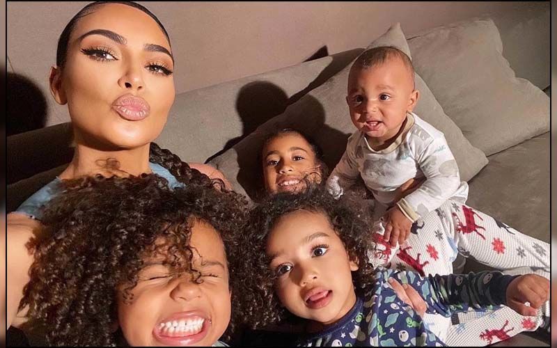 Kim Kardashian Shares A Throwback Monochrome Picture As She Twins In White With Her Little Munchkins North, Saint, Chicago And Psalm