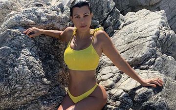 Kourtney Kardashian Strips Down To A Skimpy Black Bikini As She Flaunts Her Enviable Body; The Lady Is Ageing In Reverse