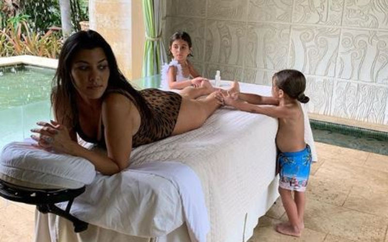 Kourtney Kardashian Gets A Massage From The Cutest Masseurs Ever; Beat That