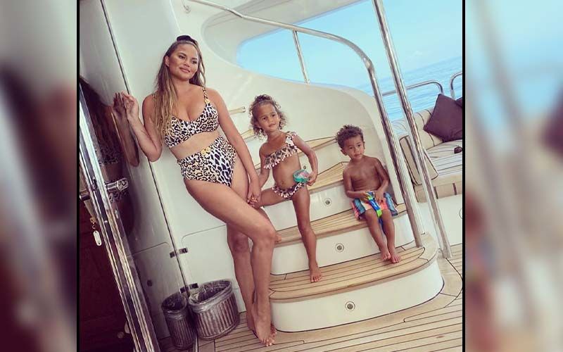 Chrissy Teigen Rocks her Swimwear; Her Latest Obsession Is Hot And Makes Her Look Sassy