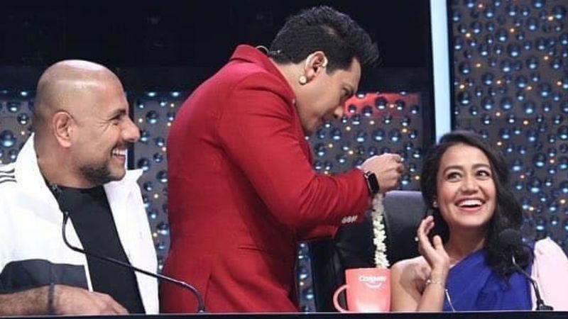 Indian Idol 11: Aditya Narayan Ties Gajra On Judge Neha Kakkar’s Hair Making The Latter Blush Heavily