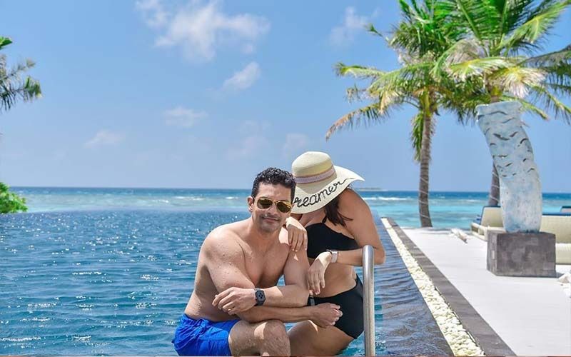 Neha Dhupia Posts Hubby Angad Bedi’s Pool Picture In Maldives With A Woman In Black Bikini; Asks ‘Should I Be Worried?’
