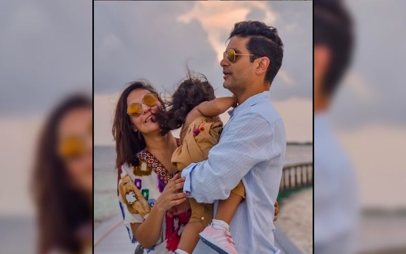 Neha Dhupia And Angad Bedi's Daughter Mehr Waves 'Hi' To The Paparazzi As She Holds Her Parents' Hands At The Airport – VIDEO