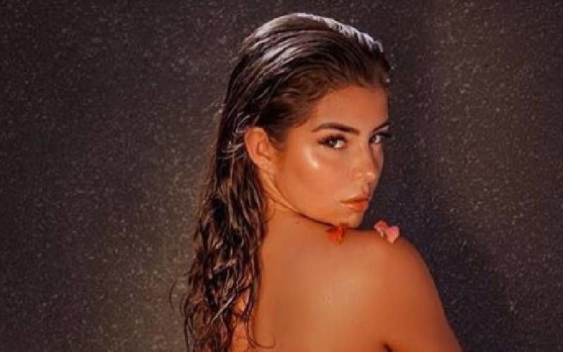 Bikini Model Demi Rose Soaks In A Tub Of Flowers Completely Nude; Has Plans To Visit Your Dream - Excited Much?