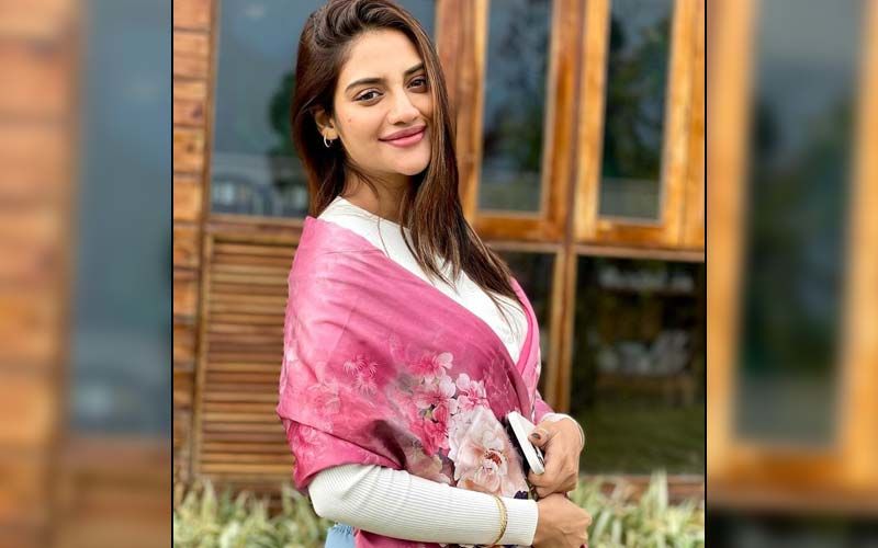 Bengali Actress And MP Nusrat Jahan Adds Fuel To Pregnancy Rumours As She Hides Her Tummy In Latest Photos