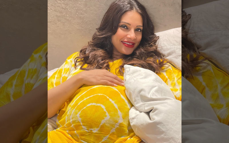 Bipasha Basu Flaunts Her Pregnancy Glow In Yellow Dress As She Cradles Her Baby Bump In PICS Clicked By Hubby Karan Singh Grover