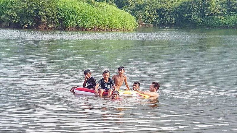 Salman Khan Takes A Dip In A Lake With Some Cool Kids, Says, 'Paani Main Gote Lagaye Aapke Bhai Ne Kal'