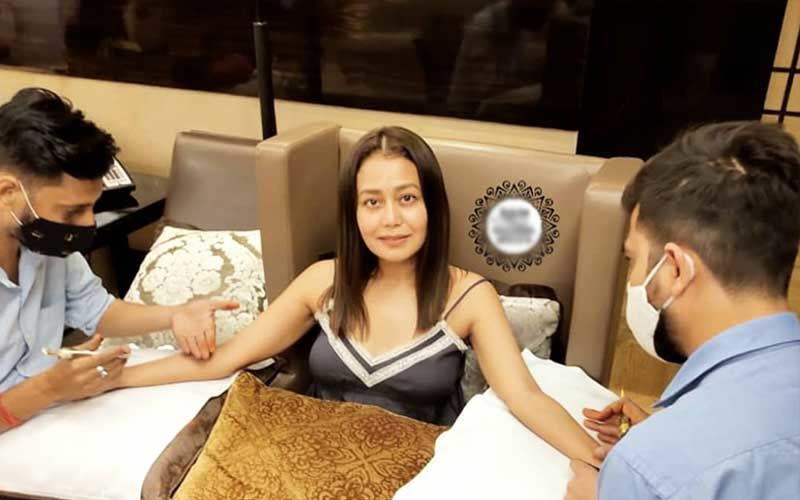 Neha Kakkar-Rohanpreet Singh Wedding: Bride-To-Be Wears A Comfy Strappy Black Top And White Sneakers As She Gets Mehendi Applied On Her Hands