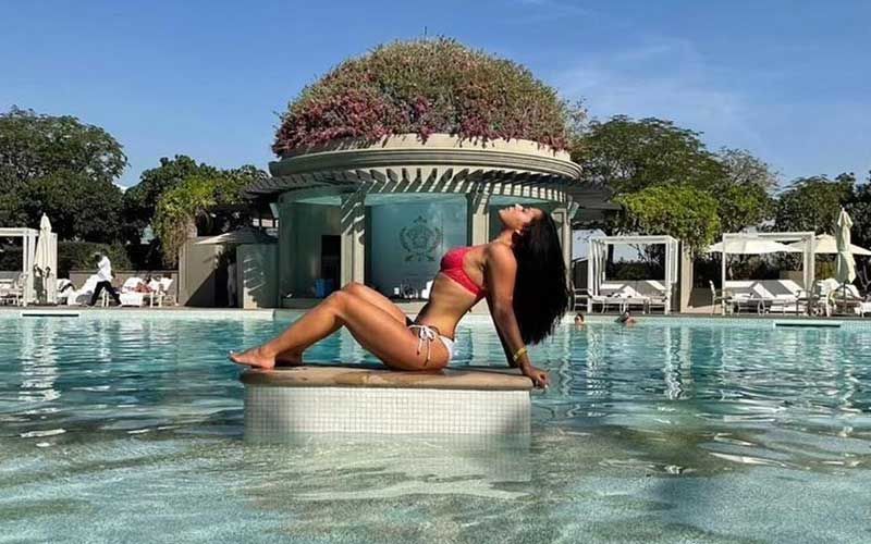 Tiger Shroff’s Sis Krishna Shroff Chills In The Middle Of A Pool; Strikes A Sexy Pose In A Red Hot Skimpy Bikini Showing Off Her Curvaceous Body