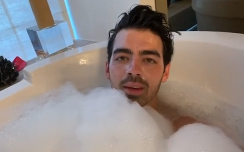 Joe Jonas Unwinds In A Bathtub Full Of Bubbles Post Crashing Fans' Zoom Watch Parties - WATCH
