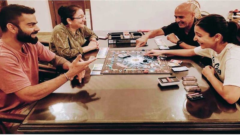 Anushka Sharma Shares A Happy Pic With Virat Kohli And Her Parents Playing Monopoly; Urges Fans To Make Most Of These Moments