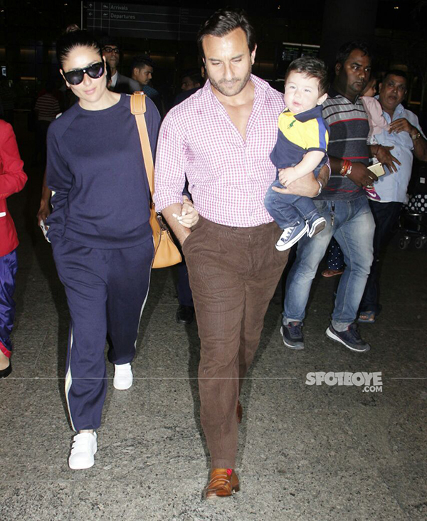 Saif Ali Khan Kareena Kapoor and their lil one Taimur spotted exiting the airport