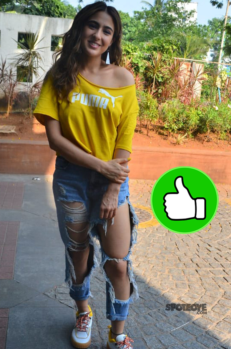 Sara Ali Khan in white crop top and yoga pants leaves Mumbai