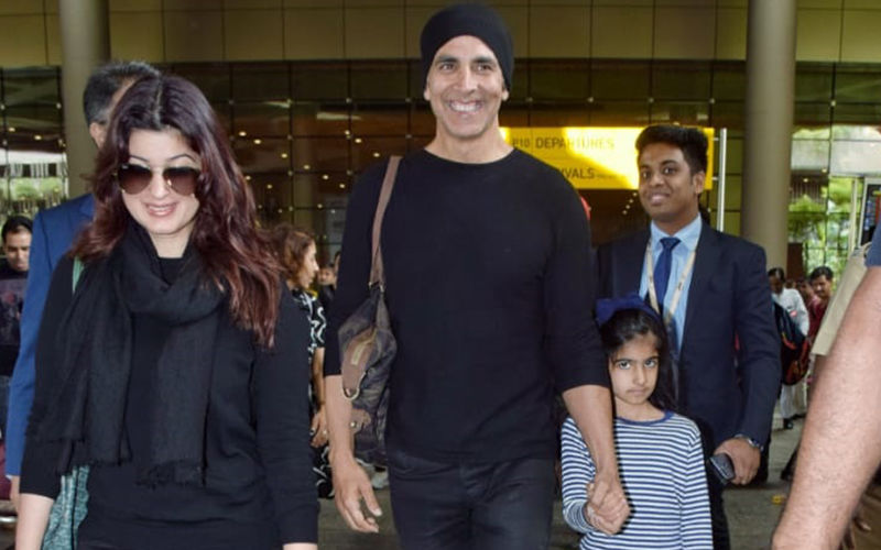 Twinning In Black Akshay Kumar And Twinkle Khanna Return To Mumbai With Li’l Nitara