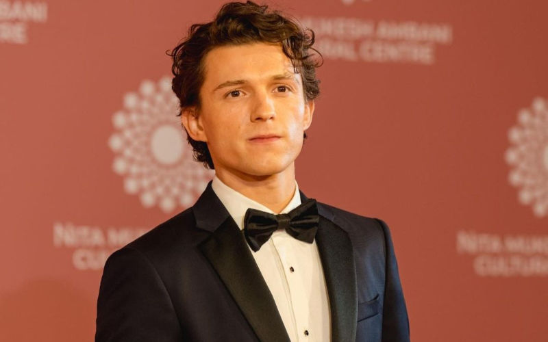 VIRAL! Desis Confuse Tom Holland With Author Of Same Name! Indian Fans Tag Him In Hollywood Actor’s Pics From NMACC; Says ‘Please Make It Stop’