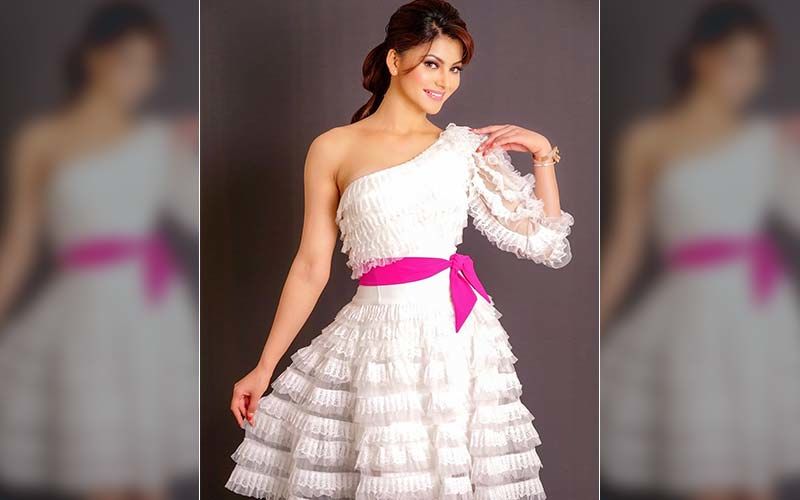 Urvashi Tells How Not To Do Ruffles In White One-Shoulder Dress
