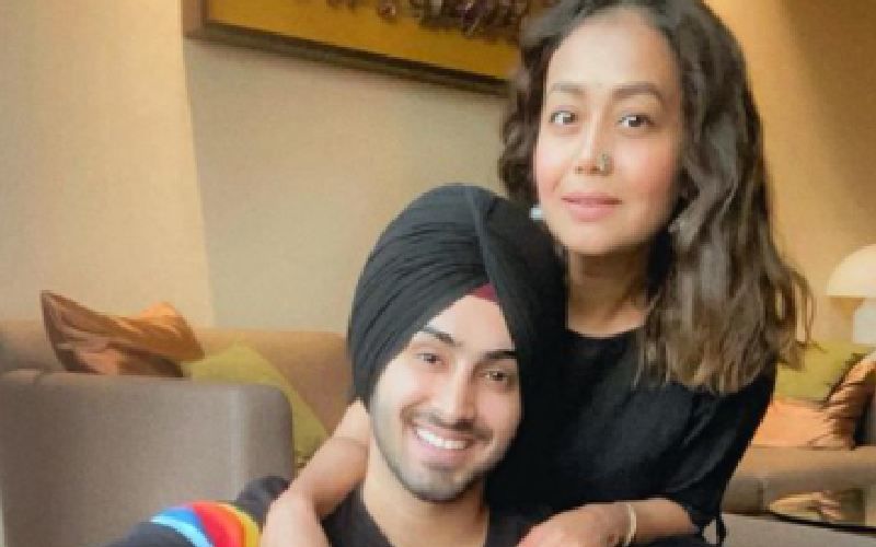 Preggers Neha Kakkar And Rohanpreet Singh's Latest Airport Pic Leave Fans Confused; Raise Question Over Her Baby Bump Saying 'She's Not Looking Pregnant'