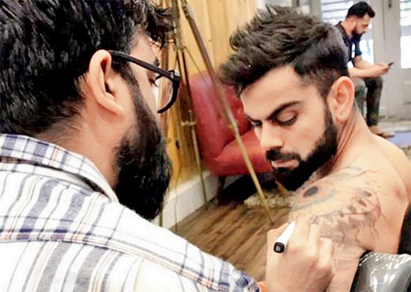 Virat Kohli Getting Tattoed