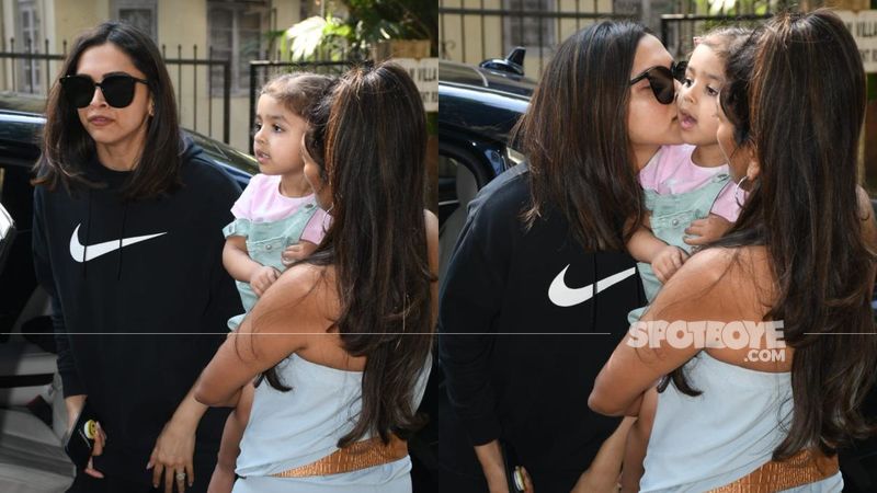 Deepika Padukone Distracted By A Cute Little Fan During Clinic Visit; Actress Plants A Kiss On The Little Parcel's Cheeks