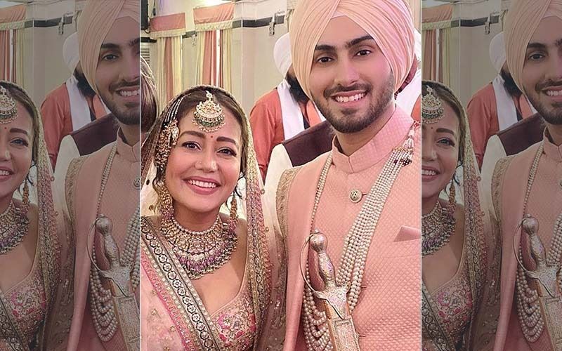 Neha Kakkar-Rohanpreet Singh Share A Kiss After Exchanging Rings; Lady Thanks Rohanpreet’s Family For ‘Best Reception Ever’-PICS