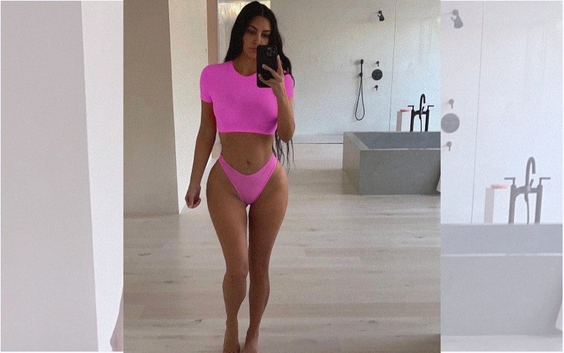 Kim Kardashian shows off ample cleavage & tiny waist in new SKIMS