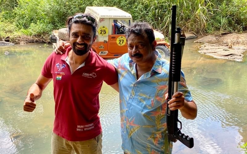Ram Gopal Varma Poses With GUN In His Hand! Shares Picture With Rain Forest Challenge India Championship Winner Chethan- PIC INSIDE