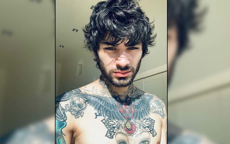 Zayn Malik Confronts A Passer-By After Being Called Homophobic Slur Outside NYC Bar; Singer Spotted Shirtless In Heated Argument Caught On Camera-WATCH