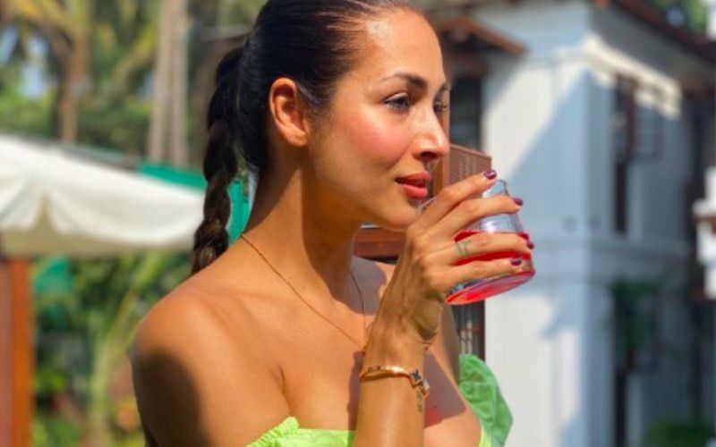Malaika Arora Wears A Flirty Green Bikini Sipping On A Drink As She Tells Us How All Sundays Should Look Like; It’s All Easy-Peasy-Breezy