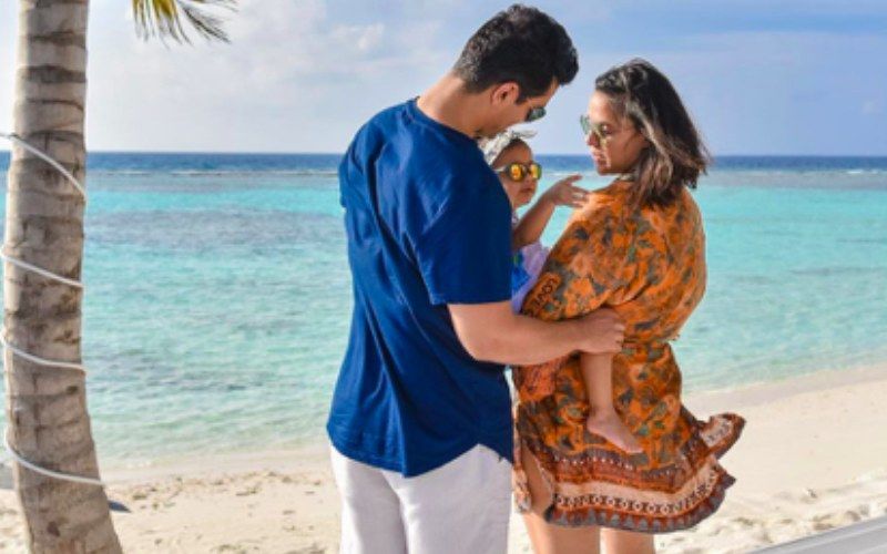 Neha Dhupia And Angad Bedi Go For A Walk On The Beach With Daughter Mehr; Check Out The 'The Sunshine And Sunglass Brigade' - See Pics