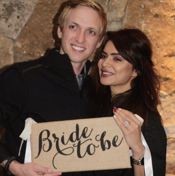 aashka goradia holds a bride to be poster