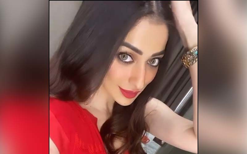 Raai Laxmi's Ditches Urban Chic Avatar For A Glimmering Saree Look In Luscious Red