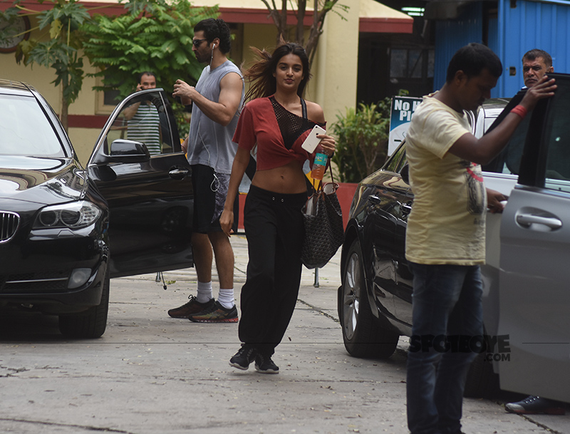 aditya roy kapur and nidhhi agerwal drive off from their gym