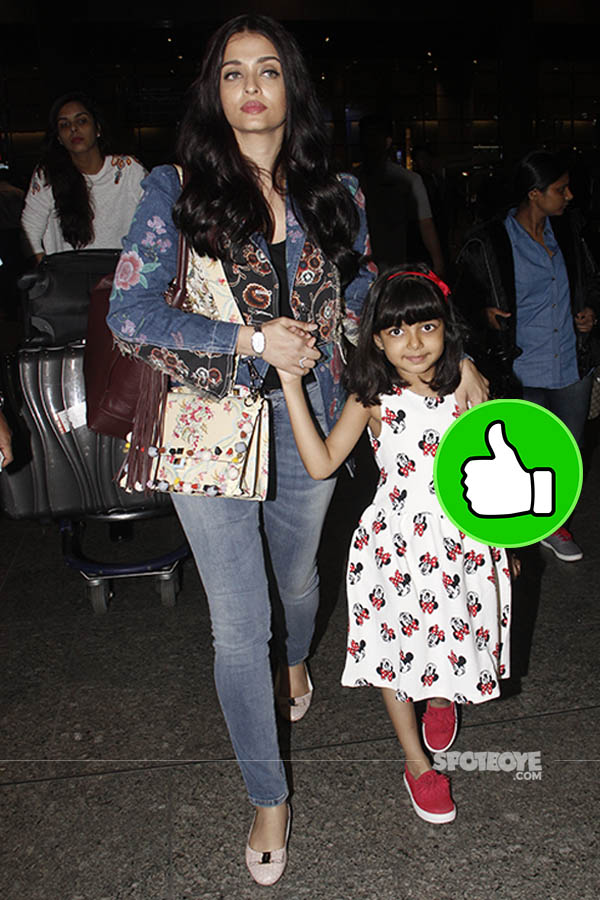 Aishwarya Rai with Abhishek Bachchan and Aaradhya switches up airport  fashion with her elegant all-black attire. Watch