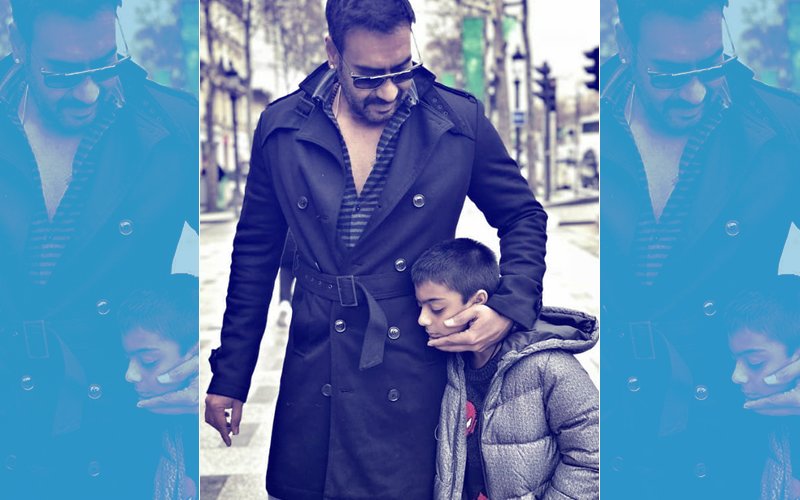 Ajay Devgn Gets Trolled For Smoking Next To His Son