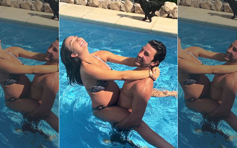 A Preggers Amy Jackson Raises The Mercury Levels In These Pool Pictures With Her Fiancé George Panayiotou