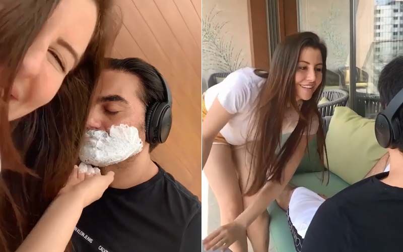 Giorgia Andriani Kills Boredom By Giving BF Arbaaz Khan A Clean Shave While He’s Asleep; Asks If She’s Being A ‘Barber Or Barbaric?’-WATCH
