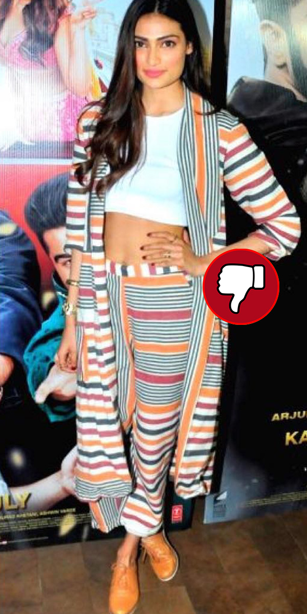 athiya shetty disappoints in a multi colour striped pant suit