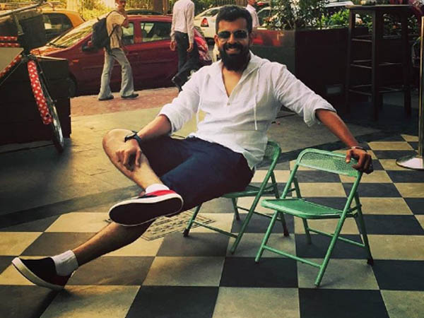 bejoy nambiar poses for a pic