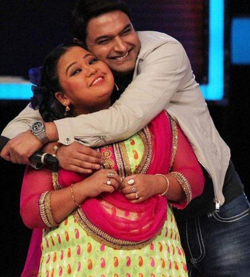 bharti singh and kapil sharma pose for a photoshoot