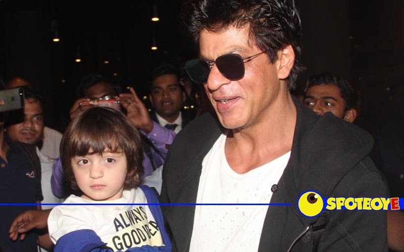 Just In: SRK lands in Mumbai with birthday boy AbRam
