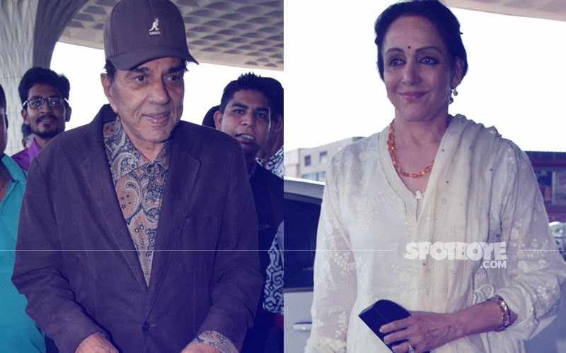 Airport Spotting: Dharmendra & Hema Malini Fly Out Of Mumbai