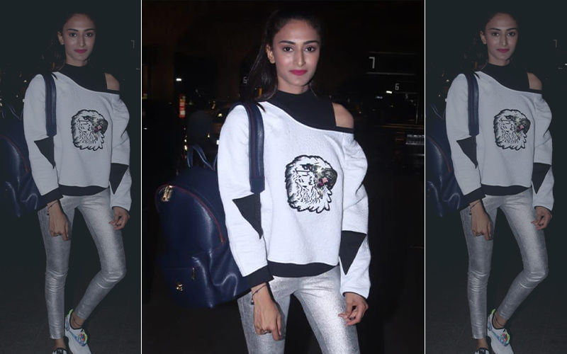 Fashion Culprit Of The Day: Erica Fernandes In White Sweatshirt And Silver Cigarette Jeggings