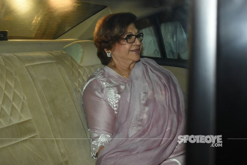 helen khan seated in a car