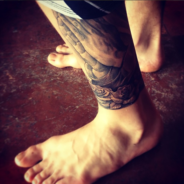 justin bieber foot tattoo